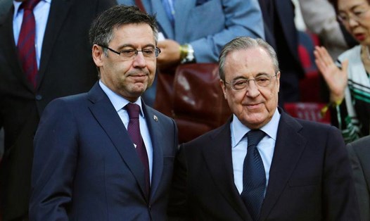 Chủ tịch Barcelona Bartomeu đang hứng chịu nhiều chỉ trích, khác hẳn với cách Perez xử lý êm thấm mọi chuyện tại Real Madrid. Ảnh: EFE.