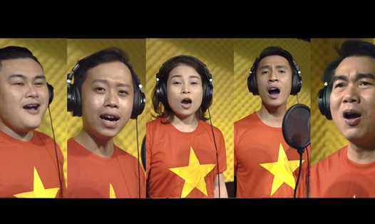 Nghệ sĩ tại Hội An hoà ca "chung sức đồng lòng, chiến thắng COVID-19". Ảnh: Thuỳ