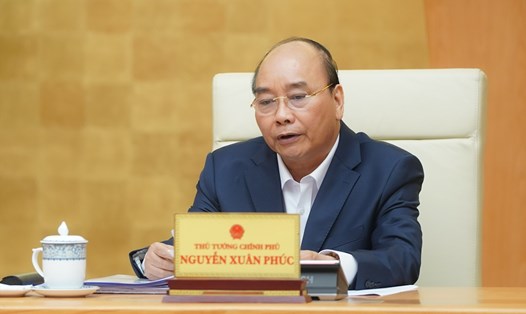 Thủ tướng Nguyễn Xuân Phúc phát biểu tại cuộc họp - Ảnh: VGP/Quang Hiếu