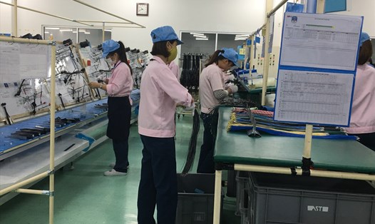 Công nhân lao động tại khu công nghiệp Quang Minh (Mê Linh, Hà Nội). Ảnh: T.E.A