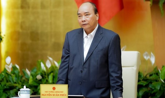 Thủ tướng Nguyễn Xuân Phúc yêu cầu việc chi trả hỗ trợ phải thuận lợi cho người lao động, người gặp khó khăn. Ảnh: VGP/Quang Hiếu