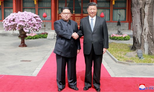 Ông Kim Jong-un và Tập Cận Bình. Ảnh: AFP