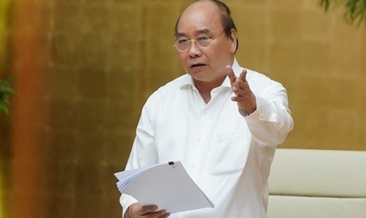Thủ tướng Nguyễn Xuân Phúc làm việc trực tuyến với lãnh đạo chủ chốt của TPHCM - Ảnh: VGP/Quang Hiếu