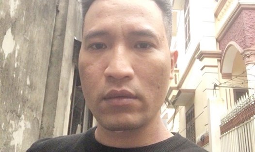 Nguyễn Văn Trung trước khi bị đưa ra TAND quận Hà Đông xét xử. Ảnh Cơ quan công an.