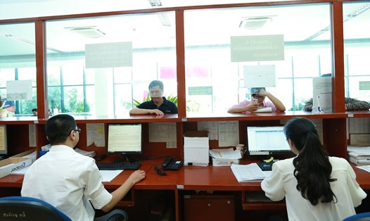 Cục Thuế Hà Nội đang chủ động xây dựng các biện pháp đôn đốc thu và cưỡng chế nợ thuế sau khi hết thời hạn gia hạn nộp thuế của người nộp thuế. Ảnh Hải Nguyễn (minh họa).