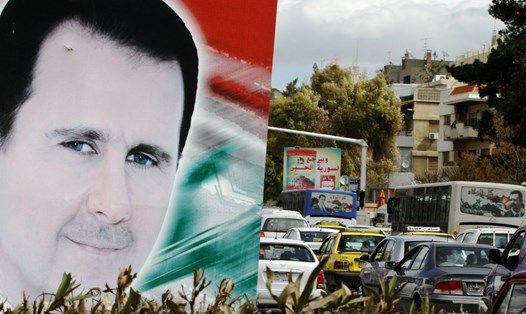 Chân dung Tổng thống Syria Bashar al-Assad ở Damascus, Syria. Ảnh: AFP.