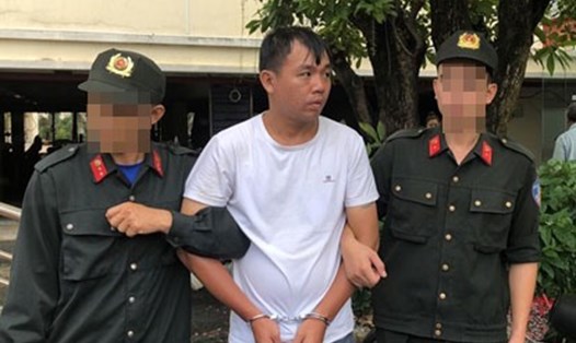 Liu Ming Yang (ở giữa) khi bị bắt giữ. Ảnh cơ quan công an.