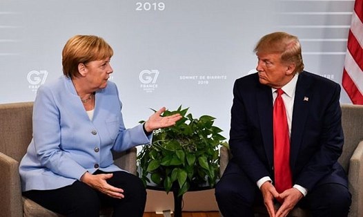 Thủ tướng Đức Angela Merkel và Tổng thống Mỹ Donald Trump. Ảnh: AFP.