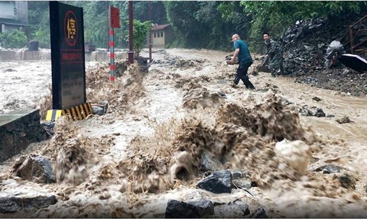 Cảnh nước lũ ở huyện Vô Tích, Trùng Khánh, Trung Quốc hồi tháng 6. Ảnh: Xinhua