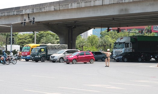Từ 5.8, CSGT cấp huyện có thể ra quốc lộ xử phạt giao thông. Ảnh minh hoạ: Lao Động