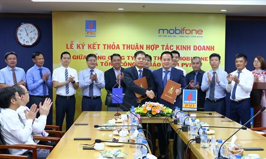 Tổng Công ty Bảo hiểm và Tổng công ty Viễn thông MobiFone PVI đã ký kết thỏa thuận hợp tác kinh doanh. Ảnh: Thu Bình