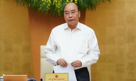 Thủ tướng Chính phủ Nguyễn Xuân Phúc chủ trì phiên họp thường kỳ tháng 7. Ảnh VGP