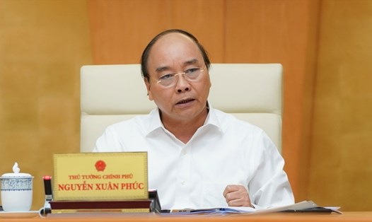 Thủ tướng Chính phủ Nguyễn Xuân Phúc chủ trì cuộc họp Thường trực Chính phủ về chống COVID-19. Ảnh VGP