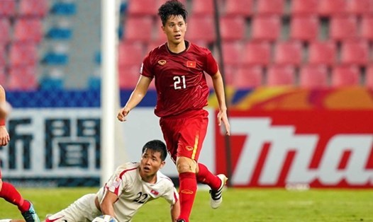 Đình Trọng trở lại thi đấu ở vòng chung kết U.23 Châu Á khi chấn thương vẫn chưa hồi phục hoàn toàn. Ảnh: P.T