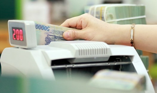 Riêng trong đó 7 tháng đầu năm 2020, tổng nợ xấu được xử lý là khoảng 63,7 nghìn tỉ đồng. Ảnh Hải Nguyễn.