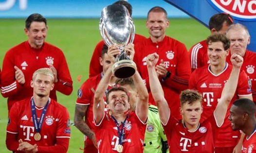Thomas Muller tạo nên kỷ lục mới cho bản thân sau khi cùng Bayern Munich đăng quang. Ảnh: Getty.