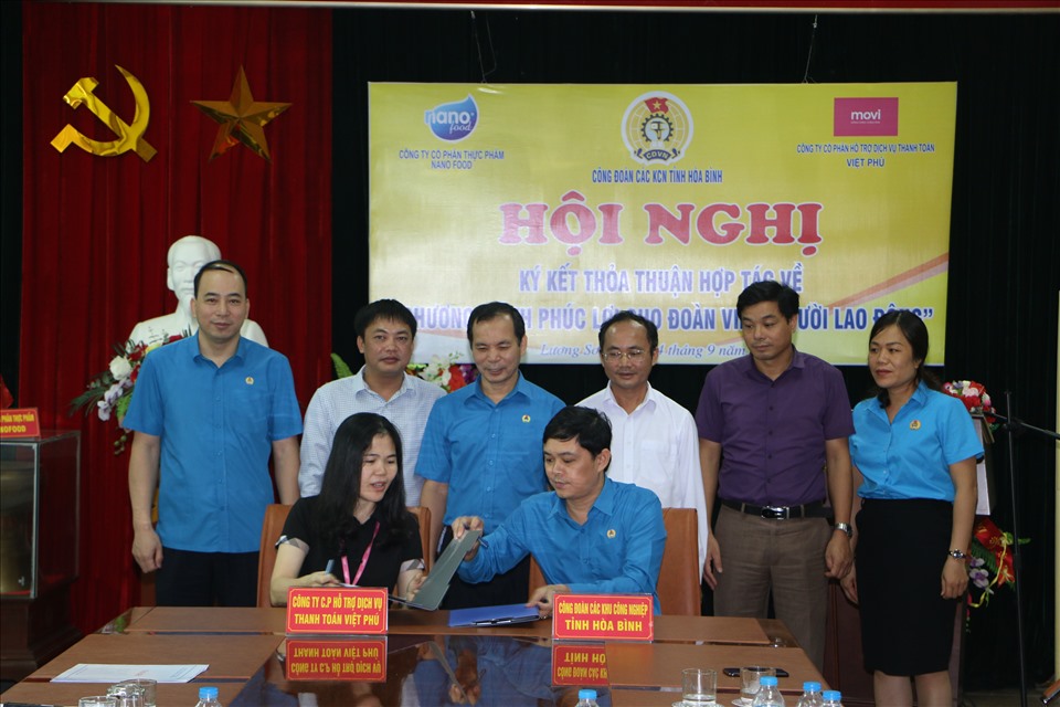 Toàn cảnh Hội nghị ký kết thoả thuận hợp tá mang lại lợi ích đoàn viên. Ảnh: Mạnh Cường.