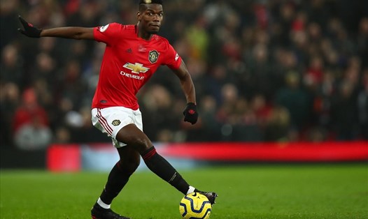 Paul Pogba đang tạm dừng việc gia hạn hợp đồng với Man United. Ảnh: Getty Images