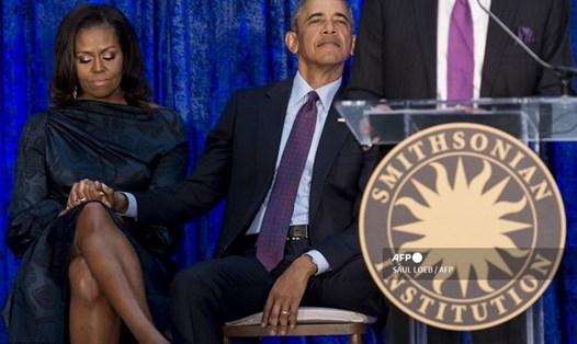 Cựu Tổng thống Mỹ Barack Obama và phu nhân Michelle Obama. Ảnh: AFP.