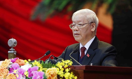 Tổng Bí thư, Chủ tịch Nước Nguyễn Phú Trọng, Trưởng Tiểu ban Văn kiện trình bày Báo cáo của Ban Chấp hành Trung ương khóa XII về các văn kiện trình Đại hội XIII của Đảng.