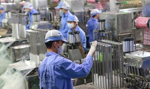 Nhiều doanh nghiệp vẫn duy trì được sản xuất kinh doanh và việc làm cho người lao động trong bối cảnh đại dịch COVID-19. Ảnh: Hải Nguyễn