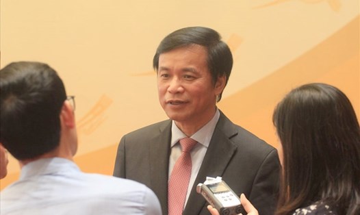 Tổng Thư ký Quốc hội, Chủ nhiệm Văn phòng Quốc hội Nguyễn Hạnh Phúc 
trả lời phỏng vấn báo chí. Ảnh: T.Vương