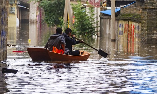 Mưa bão, lũ lụt ở Trung Quốc trong 3 quý đầu năm 2021 gây thiệt hại kinh tế 44,37 tỉ USD. Ảnh: VCG