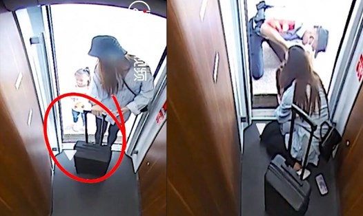 Nhân viên nhà ga ở Trung Quốc giúp giải cứu bé gái bị mắc kẹt. Ảnh chụp màn hình.