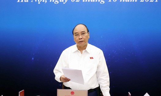 Chủ tịch nước Nguyễn Xuân Phúc tiếp xúc cử tri với doanh nghiệp TPHCM theo hình thức trực tuyến. Ảnh: TTXVN