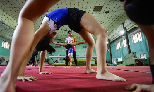 Một bức ảnh trong bộ ảnh “Bên trong lò đào tạo vận động viên thể dục dụng cụ của thành phố Hải Phòng” của Lương Viết Sơn Tùng - Huy chương Vàng ảnh hiện thực Festival nhiếp ảnh trẻ. Nguồn: CMTNATL