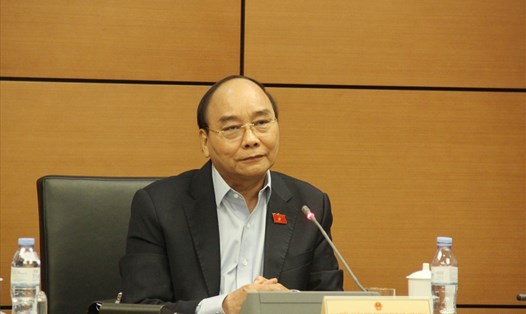Chủ tịch nước Nguyễn Xuân Phúc phát biểu thảo luận tại tổ. Ảnh PV