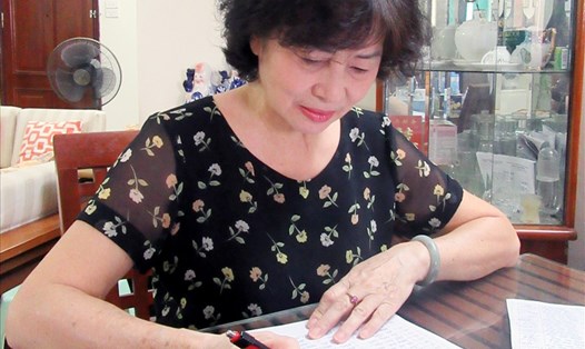 Bà Ngô Bích Ngọc - Tổ trưởng tổ dân phố 16, phường Trung Hòa, quận Cầu Giấy, Hà Nội.