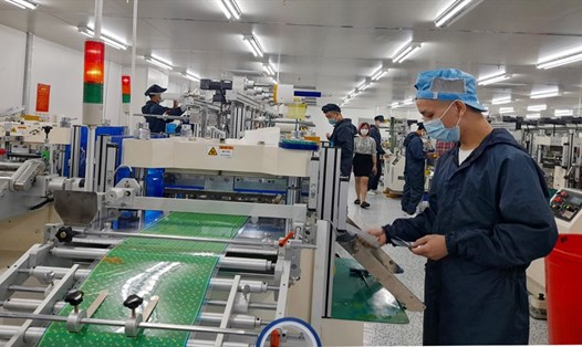 Một doanh nghiệp ở Bắc Giang khôi phục sản xuất kinh doanh. Ảnh: T.K