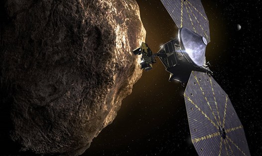 Hình minh họa cho thấy tàu vũ trụ Lucy đi qua một trong những tiểu hành tinh Trojan gần sao Mộc. Ảnh: Southwest Research Institute
