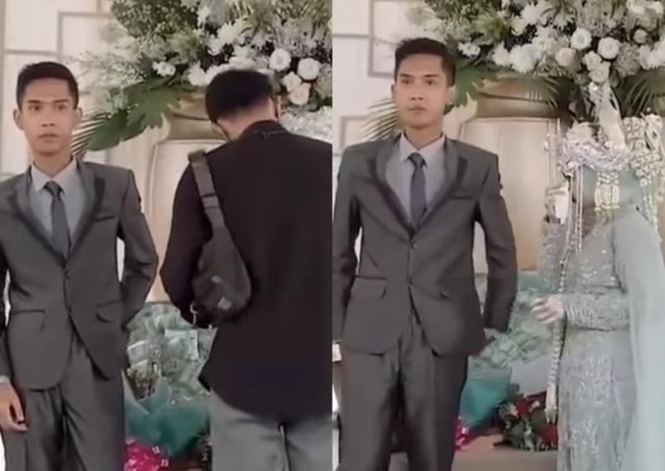 Biểu cảm đáng chú ý của chú rể Indonesia khi người yêu cũ ôm cô dâu ngay trước mặt. Ảnh chụp màn hình