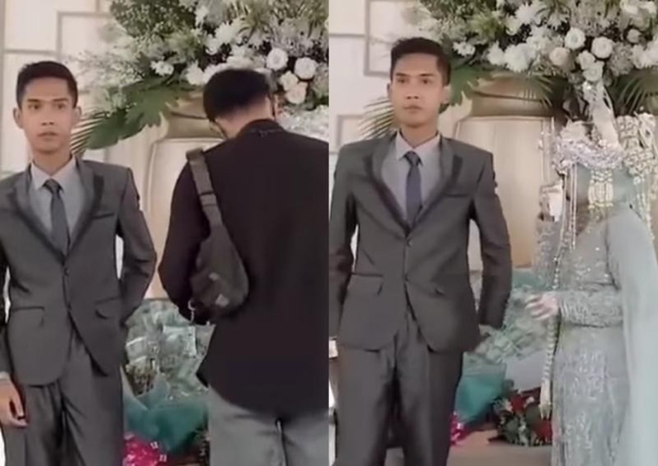 Biểu cảm đáng chú ý của chú rể Indonesia khi người yêu cũ ôm cô dâu ngay trước mặt. Ảnh chụp màn hình Biểu cảm đáng chú ý của chú rể Indonesia khi người yêu cũ ôm cô dâu ngay trước mặt. Ảnh chụp màn hình