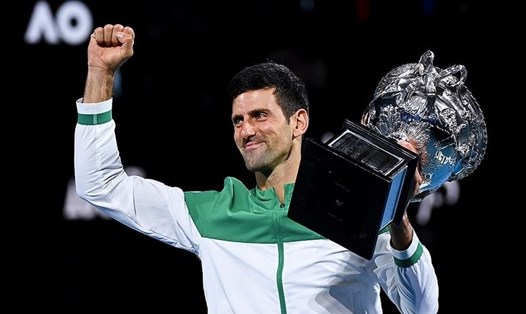 Nếu không tiêm vaccine COVID-19, Novak Djokovic sẽ không có cơ hội bảo vệ chức vô địch Australian Open. Ảnh: AFP