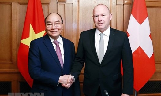 Chủ tịch nước Nguyễn Xuân Phúc hội kiến với Chủ tịch Hội đồng Quốc gia Liên bang Thụy Sĩ Andreas Aebi. Ảnh: TTXVN