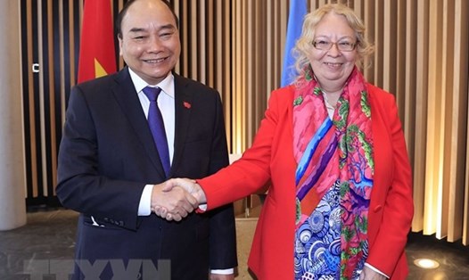 Chủ tịch nước Nguyễn Xuân Phúc gặp Tổng giám đốc Văn phòng Liên Hợp Quốc tại Geneva, bà Tatiana Valovaya. Ảnh: TTXVN