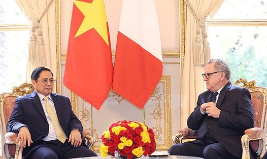 Thủ tướng Phạm Minh Chính và Chủ tịch Quốc hội Pháp Richard Ferrand. Ảnh: TTXVN