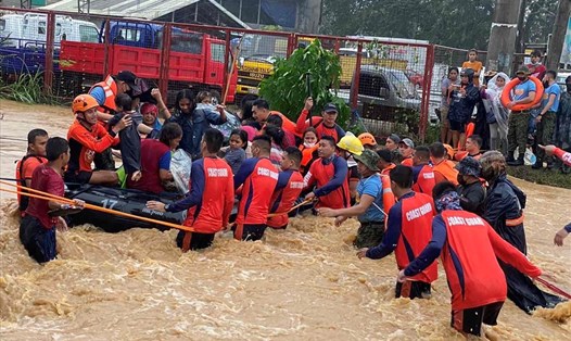 Bão Rai gây lũ lụt ở thành phố Cagayan de Oro, Mindanao ngày 16.12. Ảnh: AFP