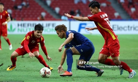 Tuyển Việt Nam đối đầu Thái Lan tại bán kết AFF Cup 2020.  Ảnh: AFP