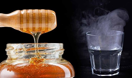 Uống nước ấm mật ong giúp tăng cường miễn dịch và hỗ trợ giảm cân. Ảnh: AFP