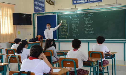 Học sinh lớp 1, lớp 9, lớp 12 tại TPHCM sẽ đi học trực tiếp từ ngày 13.12. Ảnh: Huyên Nguyễn
