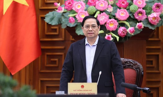 Thủ tướng Phạm Minh Chính chủ trì cuộc họp với các tỉnh khu vực miền Trung và Tây Nguyên đang chịu ảnh hưởng của bão lũ. Ảnh: Dương Giang