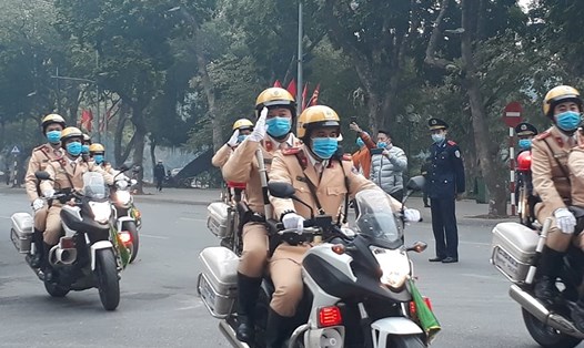 Lực lượng Cảnh sát giao thông Hà Nội ra quân đảm bảo trật tự an toàn giao thông Tết Nguyên đán Tân Sửu và Lễ hội Xuân năm 2021. Ảnh ĐT