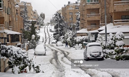Băng tuyết bao phủ nhiều con phố. Ảnh minh hoạ: AFP.