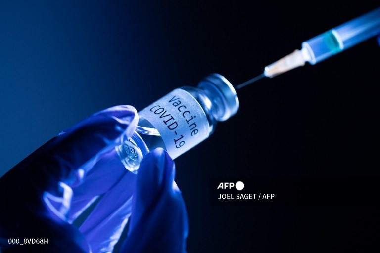 Các vaccine COVID-19 sử dụng công nghệ vector virus lộ điểm yếu đáng ngại nếu việc tiêm chủng trở thành thường xuyên. Ảnh: AFP