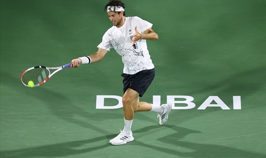 Dominic Thiem bất ngờ bị loại ngay từ vòng 2 Dubai Championship 2021. Ảnh: AFP