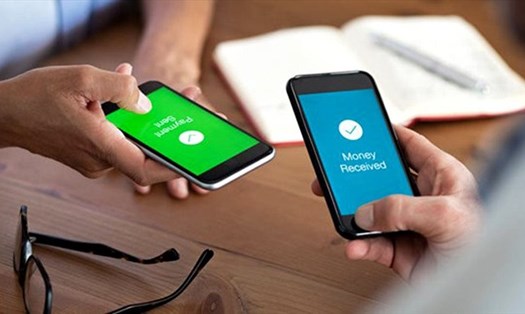 Mobile Money được kì vọng sẽ là cú hích giúp thúc đẩy thanh toán không dùng tiền mặt và chuyển đổi số của Việt Nam. Ảnh TL